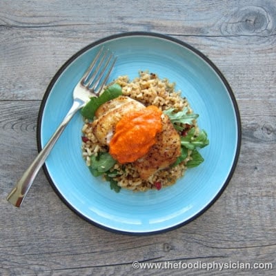sablefish with romesco on a plate