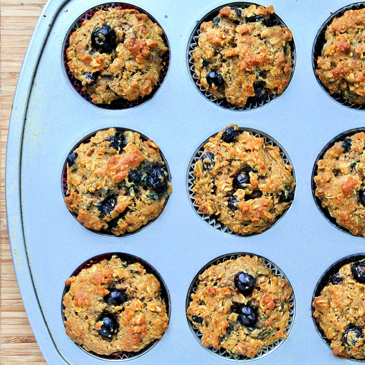 Flaxseed muffins in muffin pan.