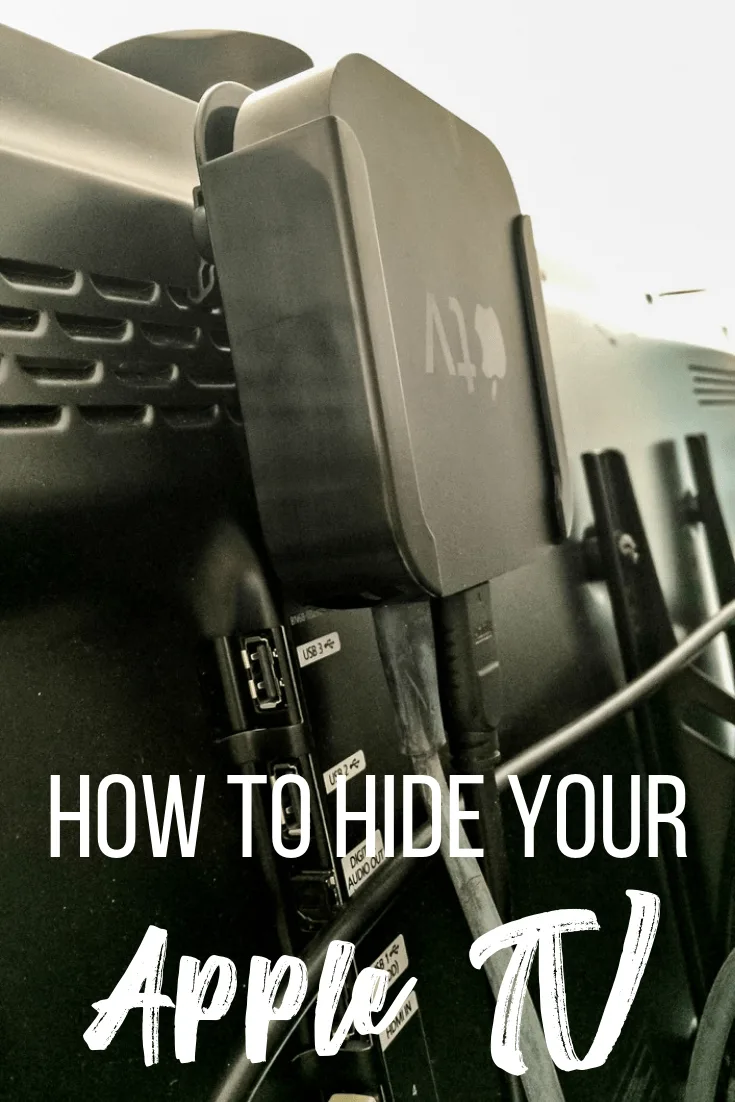 Apple TV mount on back of flat screen TV with text overlay reading "How to Hide Your Apple TV"