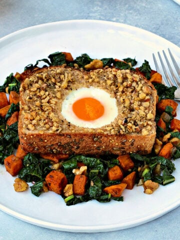 Walnut-Crusted Toad in a Hole with Sweet Potato & Kale Hash