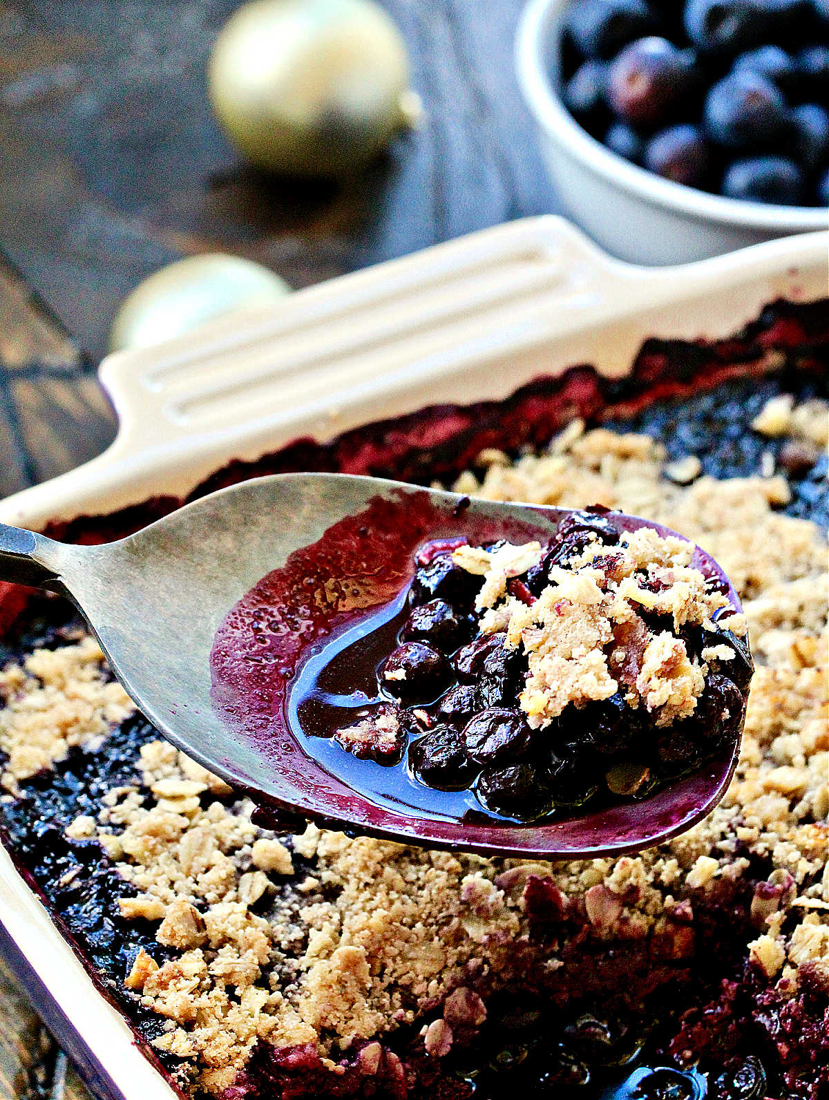 Spoon of blueberry crisp