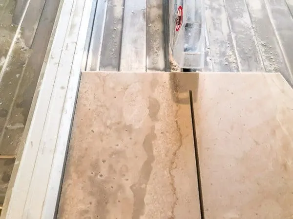 cutting limestone tile on a tile saw