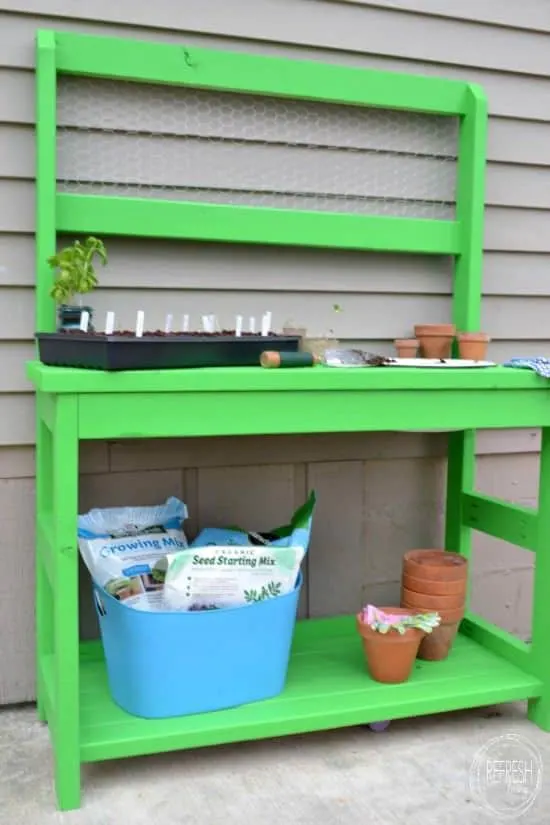 DIY potting bench with chicken wire back