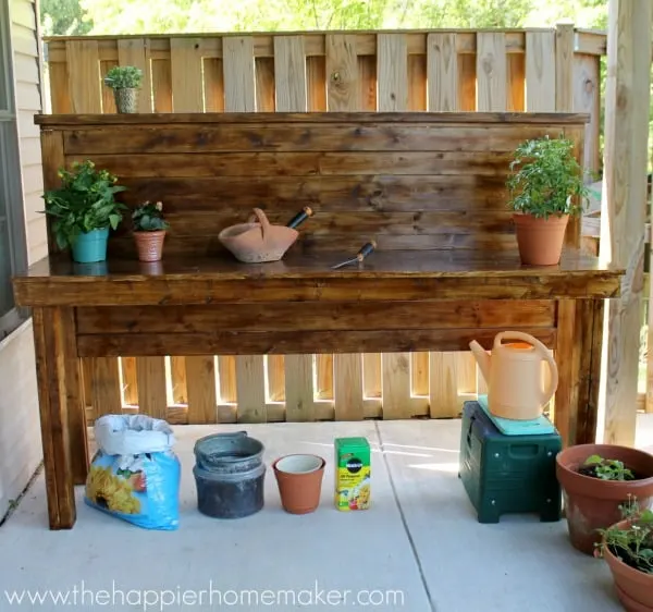 DIY potting bench made from a headboard