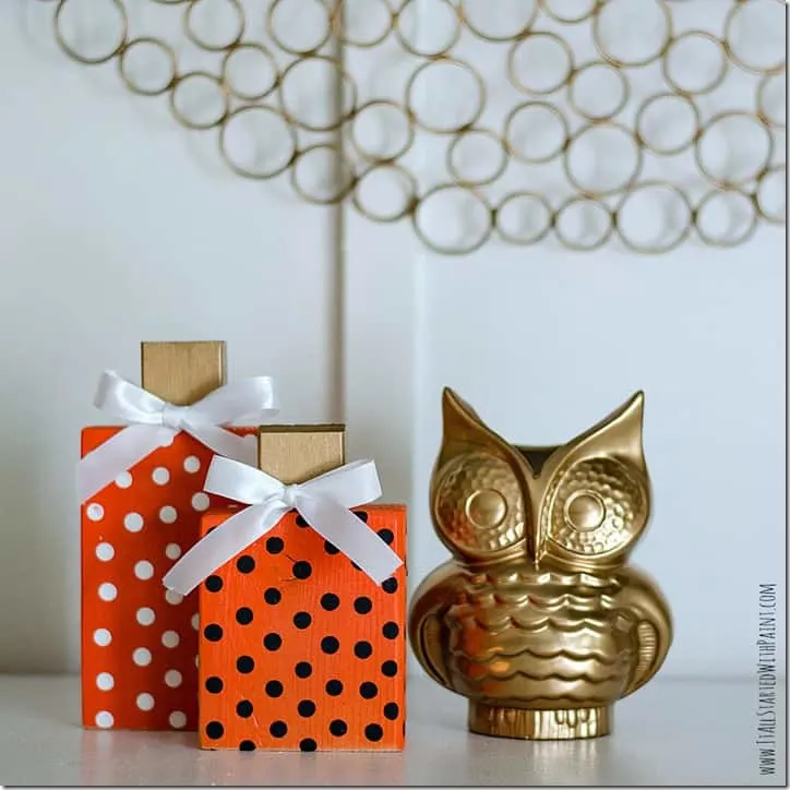 orange polka dot wooden pumpkins with gold owl