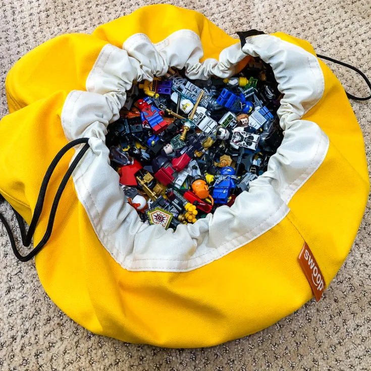 Lego minifigures stored in Mini Swoop Bag
