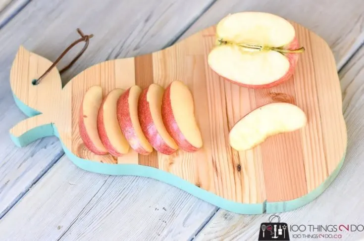 pear shaped cutting board with blue painted edges