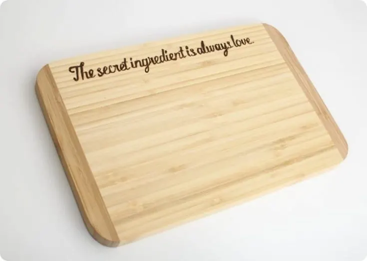 cutting board with custom wood burned message