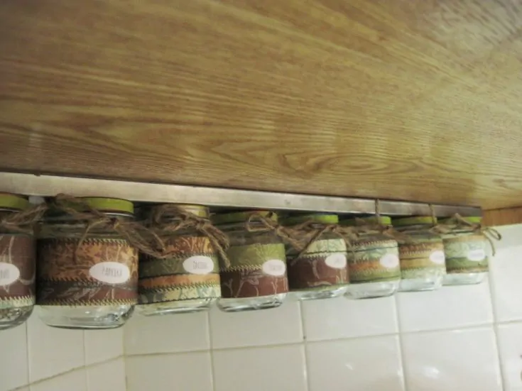 baby food jar spice rack mounted under cabinets