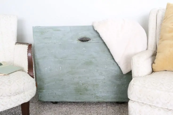 repurposed flour cabinet turned into blanket storage