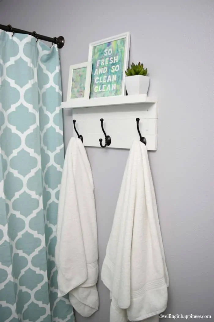 Small towel rack with shelf