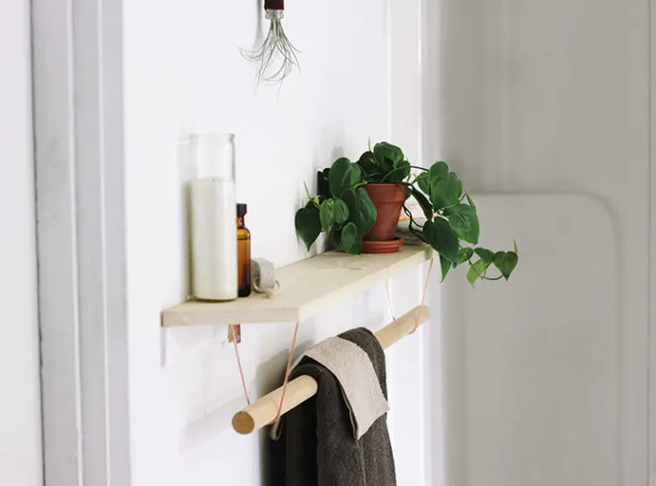 wood and copper towel rack