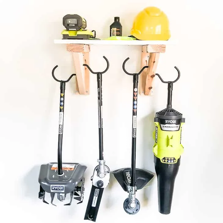 landscaping tool attachment storage rack