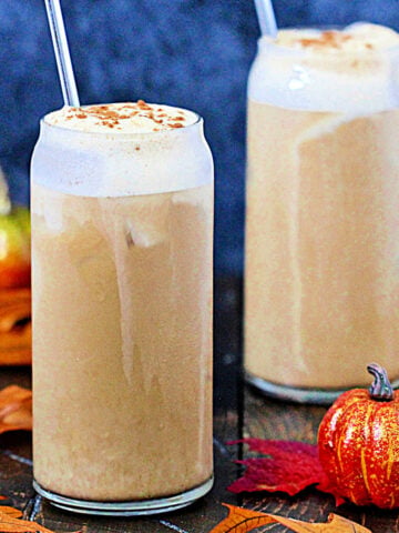 Dairy-Free Pumpkin Cream Cold Brew in 2 tall glasses.