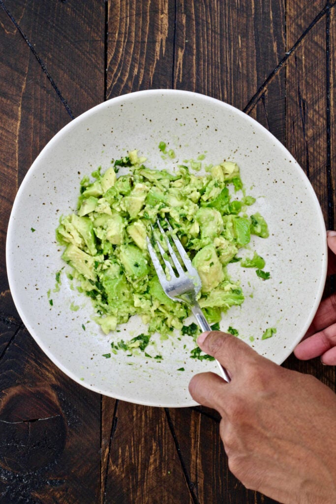 smashed avocado in bowl