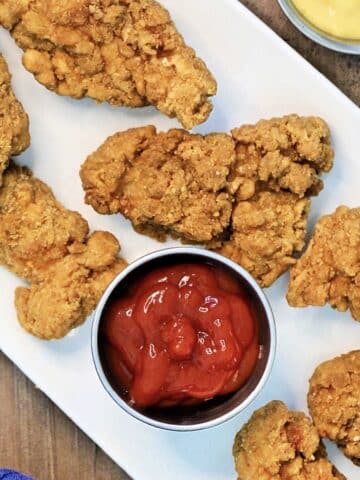 chicken tenders on a plate overhead