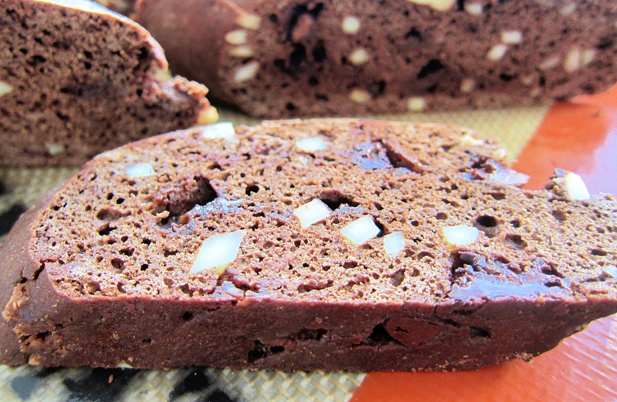 A piece of biscotti on a sheet pan.