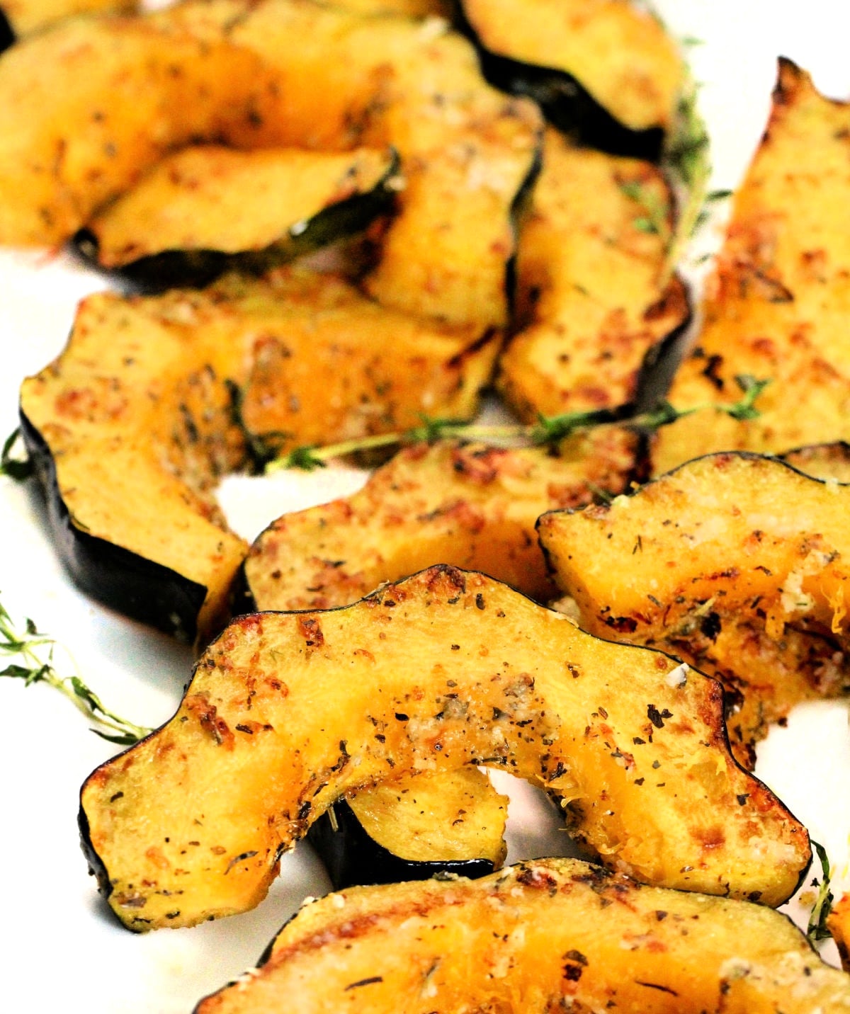Air fryer corn squash slices on a plate.