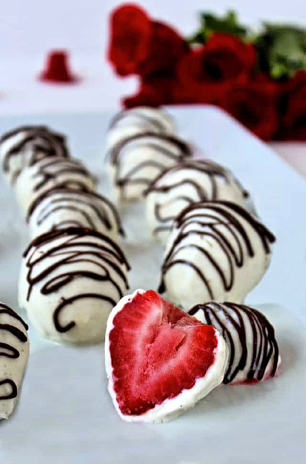Yogurt dipped strawberries with a chocolate drizzle.