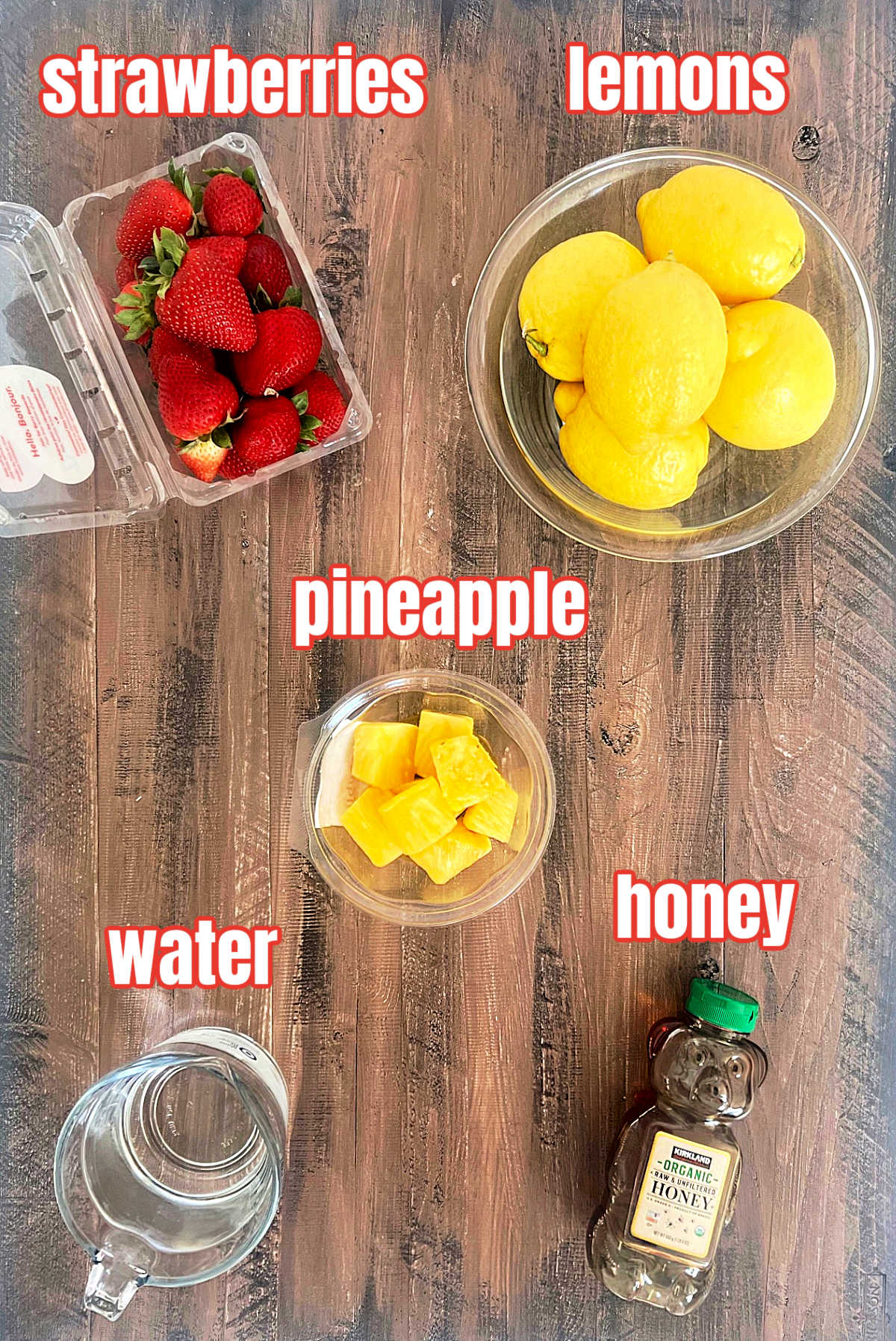 Ingredients for making strawberry pineapple lemonade