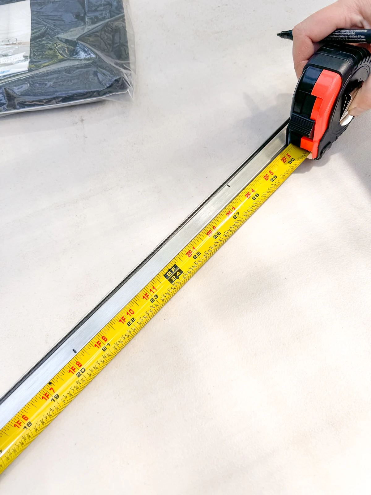 measuring and marking window screen frame piece