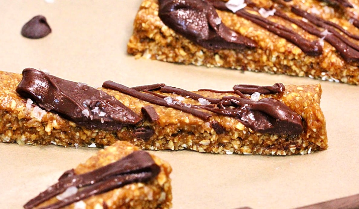 A close up of pumpkin protein bars on parchment paper.