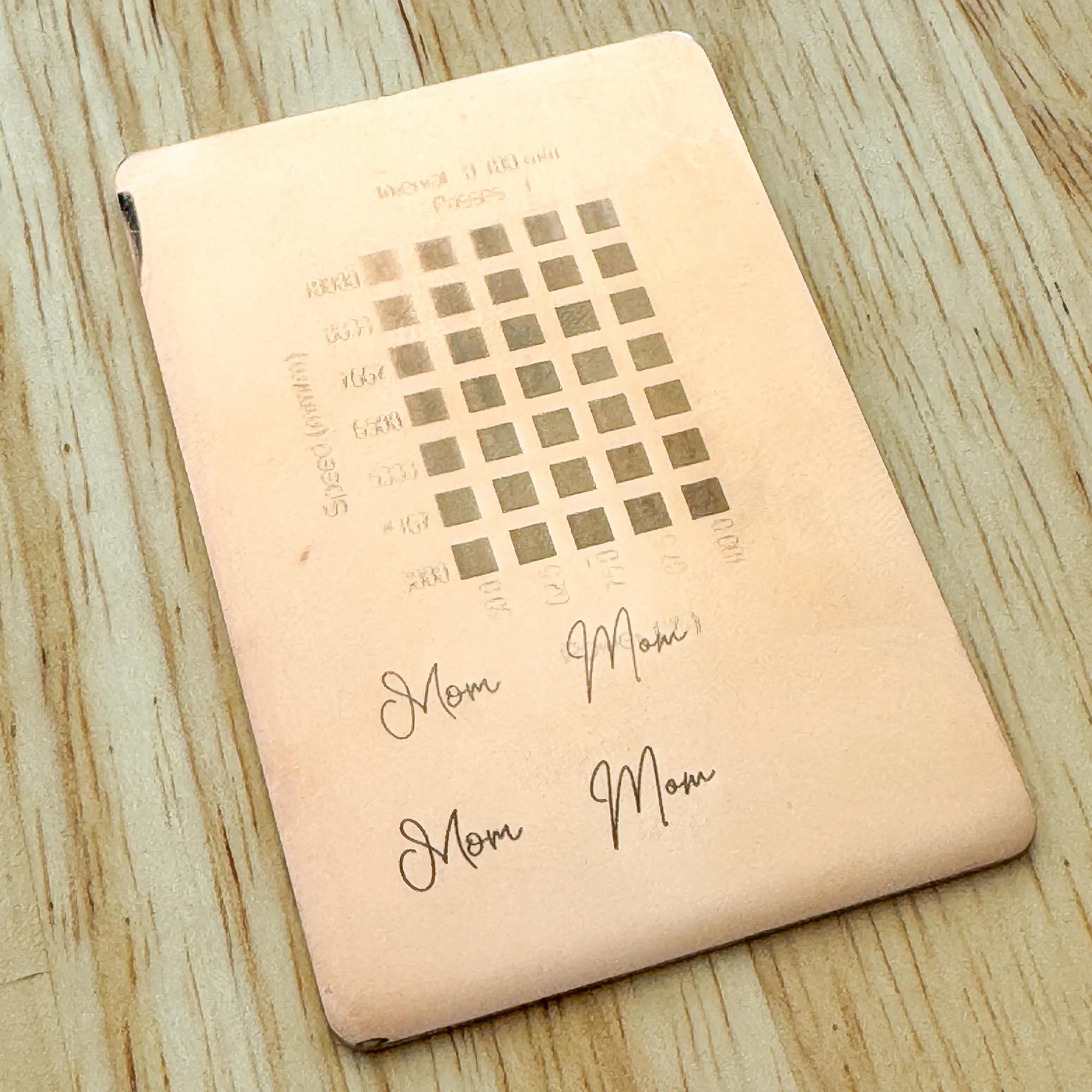 testing fonts on rose gold engraving