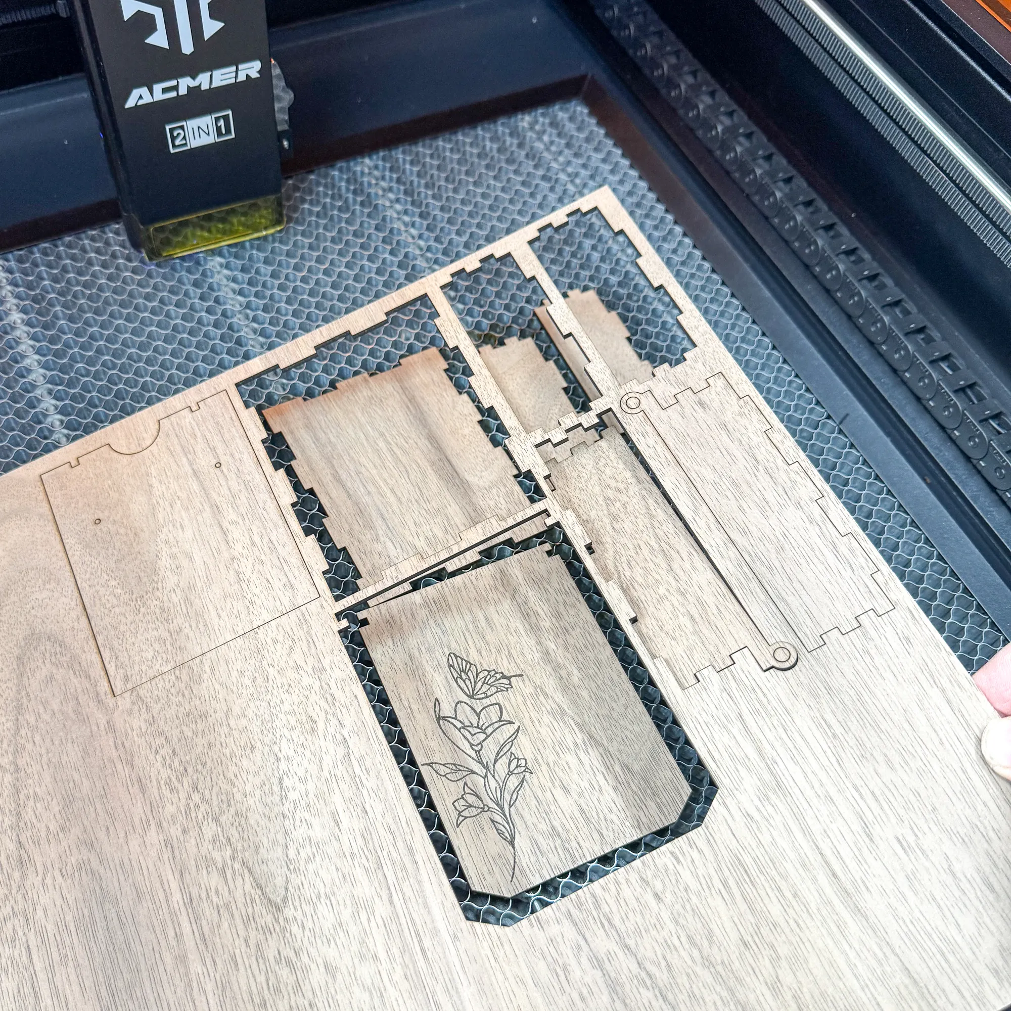 removing cut pieces from the ACMER P3 laser bed